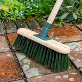 RHS-endorsed 12-inch garden brush with stiff PVC bristles, by Burgon & Ball